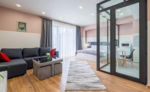 Postel nebo postele na pokoji v ubytování Devdaraki Apartments