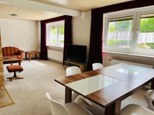 a conference room with a table and chairs at Ferienhaus Kyritz Gantikow in Mechow