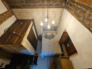 an overhead view of a kitchen with a chandelier at Hot Chipilin in Antigua Guatemala