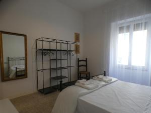 En eller flere senge i et værelse på A LA GARE