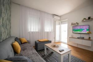 TV a/nebo společenská místnost v ubytování Aura Trebinje