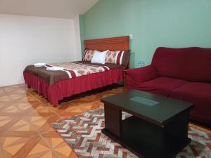 Postel nebo postele na pokoji v ubytování Hotel John & Rose