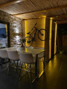 a bike hanging on the wall of a restaurant at Butiq Garden in Kemer