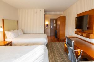 Rúm í herbergi á Holiday Inn Express Columbus Airport Easton