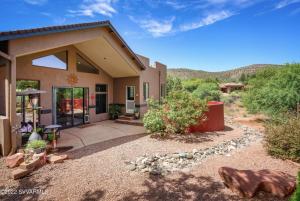 a home in the desert with a yard at Large Sedona Property with Private Pool! 7 Bedrooms! in Sedona