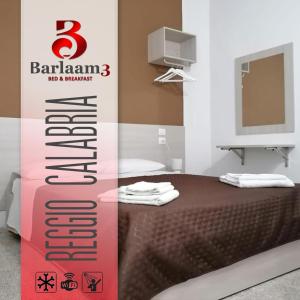 a sign for a bedroom with a bed and a television at Barlaam 3 in Reggio di Calabria