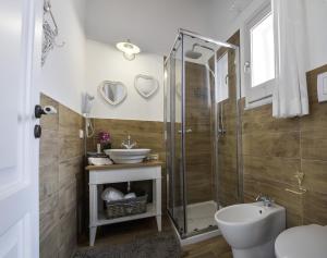 Koupelna v ubytování TAM Vacanze B&B