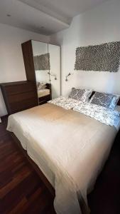 Łóżko lub łóżka w pokoju w obiekcie Apartament Willa Woda