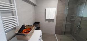 a bathroom with a toilet with a bag on top of it at Aeropis Villa, Chania in Chania +87 photos