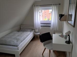Postel nebo postele na pokoji v ubytování Ferienwohnung Mühlennest