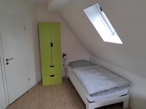 Postel nebo postele na pokoji v ubytování Ferienwohnung Mühlennest