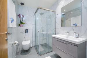 Kúpeľňa v ubytovaní Hotel ASTERA