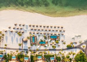 an aerial view of a resort on the beach at Fairmont Mayakoba Riviera Maya - All Inclusive in Playa del Carmen