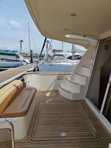 a deck of a boat with stairs on it at Seacascais, Lda in Cascais