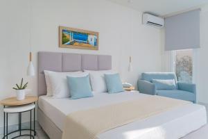 Posteľ alebo postele v izbe v ubytovaní Hotel ASTERA