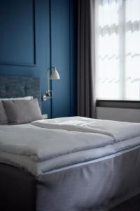 Letto o letti in una camera di Hotel Randers