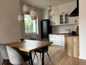 Kuchyň nebo kuchyňský kout v ubytování Apartament Iławka
