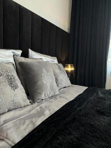 Katil atau katil-katil dalam bilik di Comfort Zone Ostróda CITY & LAKE