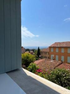 a view from the balcony of a building at Bormes - Le Loft in Bormes-les-Mimosas