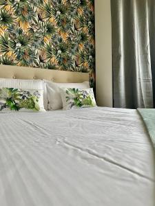 Postel nebo postele na pokoji v ubytování Grand appartement Bron centre proche Eurexpo et Groupama