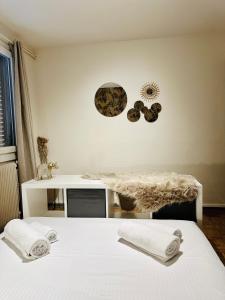 Postel nebo postele na pokoji v ubytování Grand appartement Bron centre proche Eurexpo et Groupama