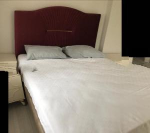 Postel nebo postele na pokoji v ubytování VİLLA HOME APART