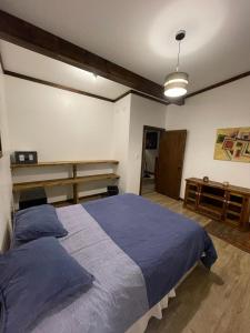 Tempat tidur dalam kamar di Pucon Villarrica Aldea Molco