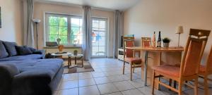 A seating area at Apartment In Spay Smile Zell-Merl Mosel