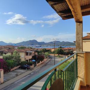 a balcony with a view of a street at Vista Mare Olbia in Olbia