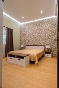 Postel nebo postele na pokoji v ubytování Aranypart