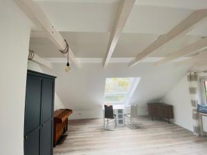 Posezení v ubytování Ferienhaus FRIESENHERZ - Traum-Landhaus mit Sauna & Wallbox