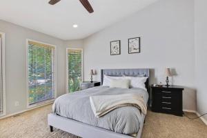 a bedroom with a large bed and a window at The Lucky 7 - Family Home in Quiet Meridian in Meridian