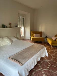 Łóżko lub łóżka w pokoju w obiekcie CÉNTRICO APARTAMENTO REFORMADO EN ARANJUEZ