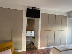 Łóżko lub łóżka w pokoju w obiekcie CÉNTRICO APARTAMENTO REFORMADO EN ARANJUEZ