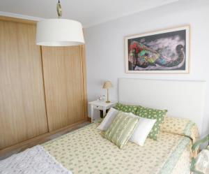 A bed or beds in a room at Varosha Combarro