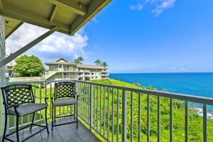 a balcony with a view of the ocean at Breathtaking Ocean View of Royal Waters! AK5202 in Princeville