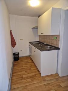 Dapur atau dapur kecil di Gemütliche kleine Wohnung