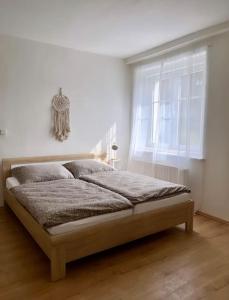 Postel nebo postele na pokoji v ubytování Chalupa Krásný Buk, České Švýcarsko