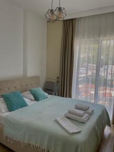Krevet ili kreveti u jedinici u okviru objekta Hotel Kaligrosh +33 fotografije