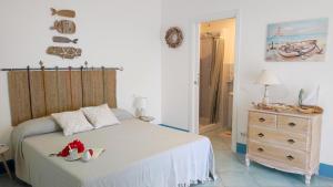 מיטה או מיטות בחדר ב-Sanacore - Maratea - Cersuta