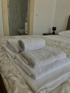 Hotel Kaligrosh客房内的一张或多张床位
