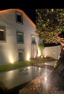 Πισίνα στο ή κοντά στο Casa de Moledo jacuzzi e sauna +28 φωτογραφίες