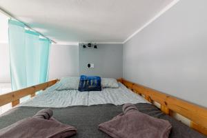 Posteľ alebo postele v izbe v ubytovaní Lelewela Apartment Slow Life