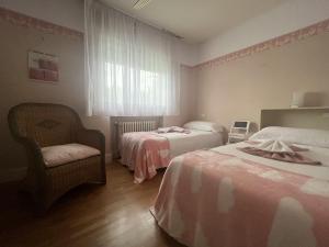 A bed or beds in a room at Casa rural Villa Verde