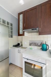 Kuchnia lub aneks kuchenny w obiekcie Lelewela Apartment Slow Life