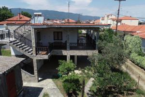an aerial view of a house with a balcony at Vrea Home in Nea Vrasna