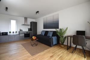 Kuchyň nebo kuchyňský kout v ubytování InHomeVision Neubau, Design, Balkon, Barrierefrei, WLAN