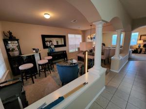 a living room with a kitchen and a dining room at D & J ESTATE in Killeen