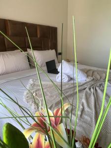 Ένα ή περισσότερα κρεβάτια σε δωμάτιο στο Appt Premium 3 rooms with big terrace at Prestigia Marrakech