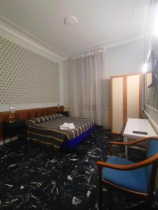 Una cama o camas en una habitación de HOTEL MILAZZO